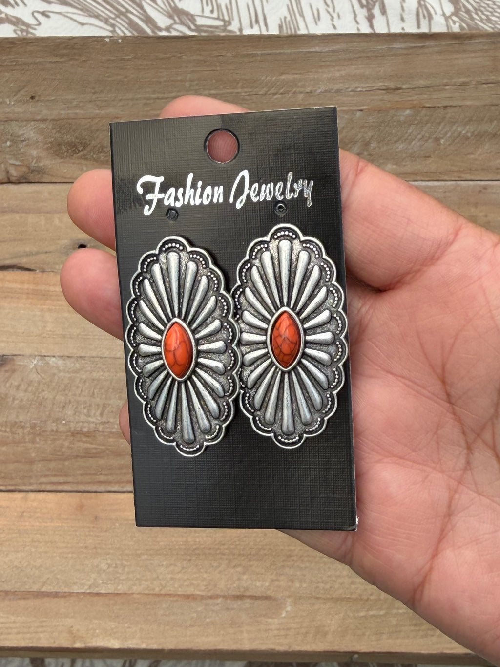 Silver and orange oval earrings
