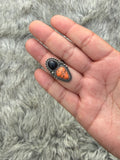 Black and orange ring