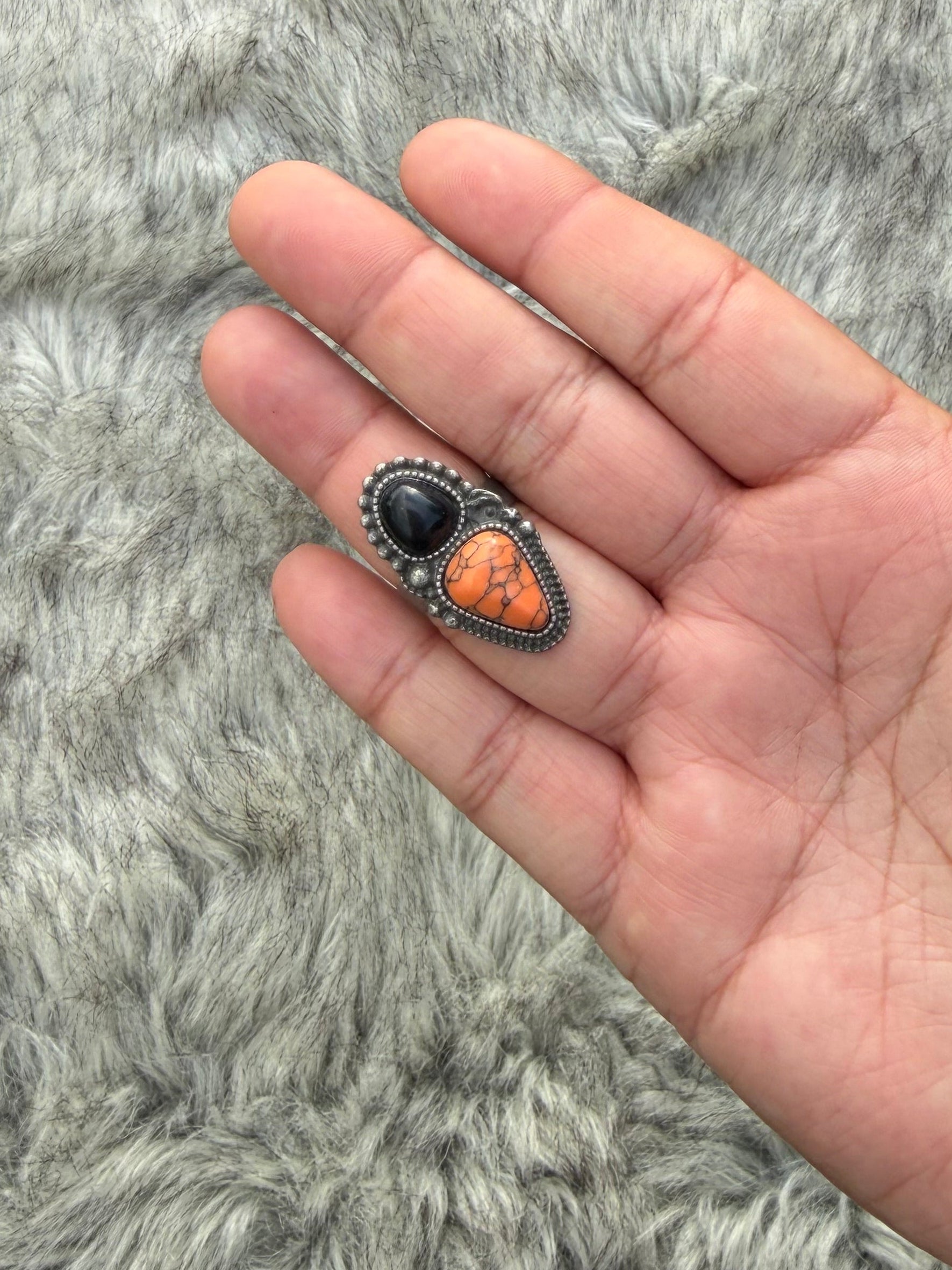 Black and orange ring