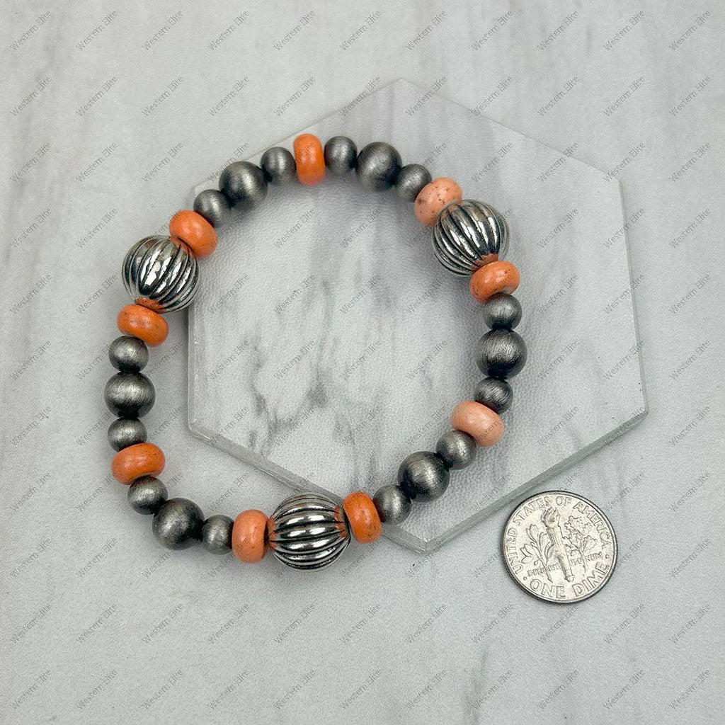 Silver and orange pearl bracelet