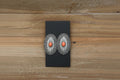 Silver and orange oval earrings