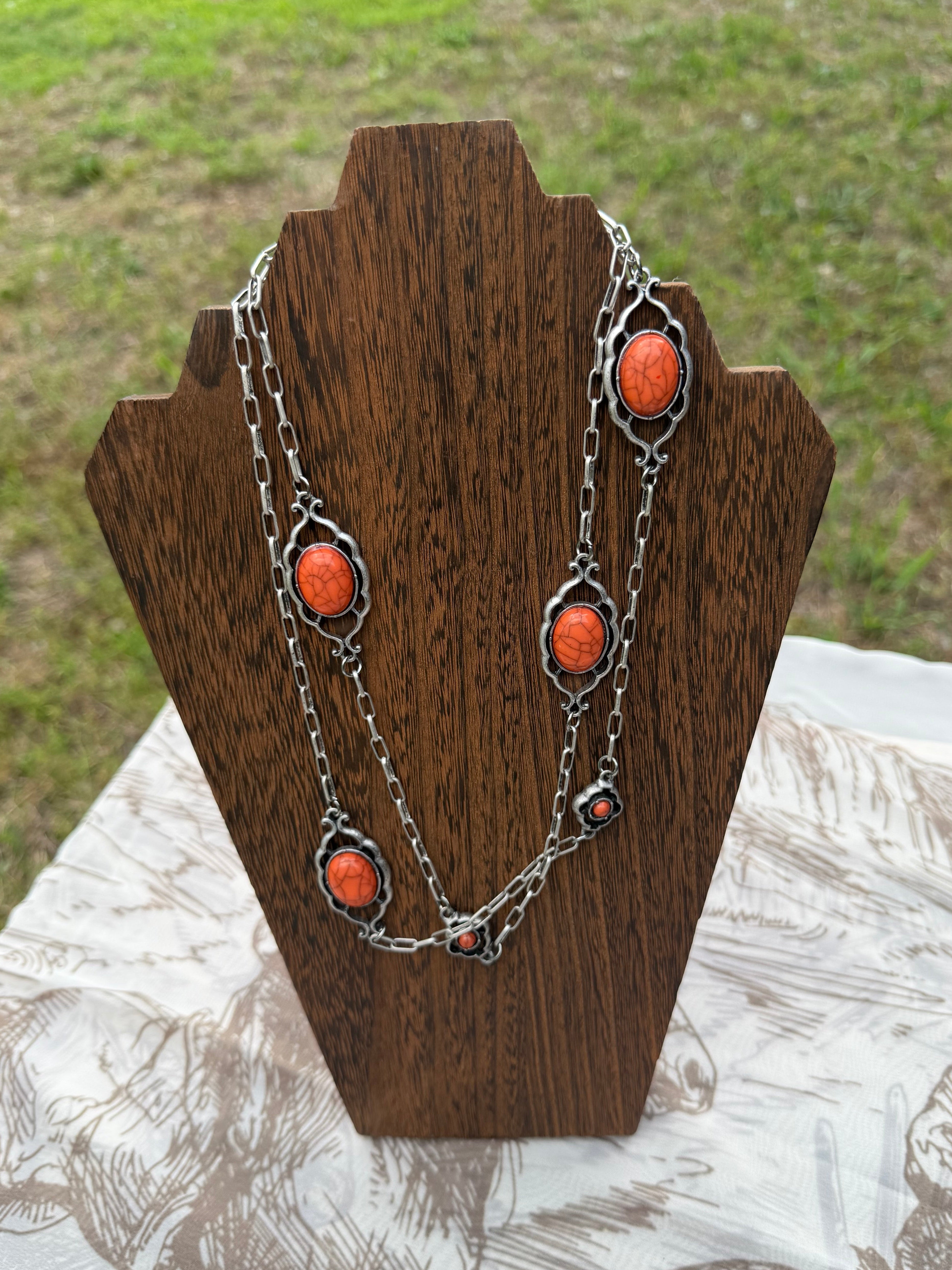 44 inch orange flower concho necklace